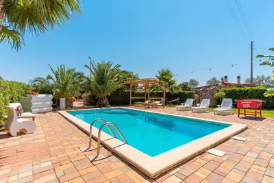 Maison de vacances 'Villa Relax' avec piscine partagée & Wi-Fi