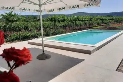 Image de New Holiday Apartment, A4+2, Family house - Opg Rudan, garden pool, terase, wi-fi