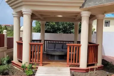 Image de 12 Star Villa 2 brCosy one bedroom fully loaded 5 min walk Darren Sammy cricket