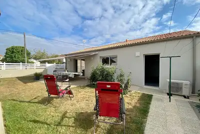 Image de Charmante maison 3 chambres près des plages avec jardin, terrasse, jeux, garage et tout compris