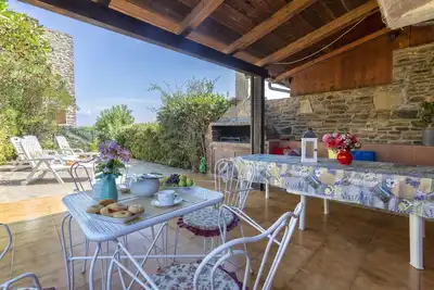 Image de Maison de vacances Villa Regina avec vue sur la mer, jardin et terrasse.