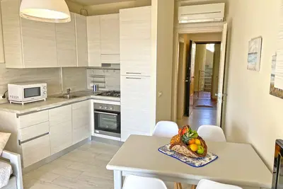 Image de Spacious Apartment 50 metres from the Sea with furnished garden