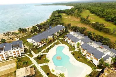 Image de 2-bedroom condo on golf course and sandy beach! Pool/tennis/gym/Tv/Wi-Fi