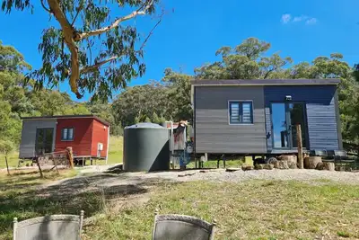 Image de Unique two tiny homes set up with private dam