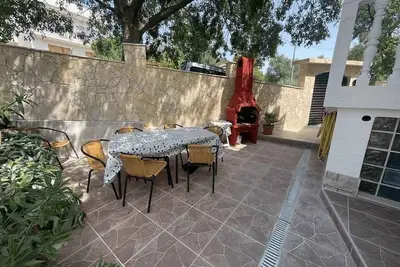 Image de Appartement de vacances avec deux chambres et un balcon