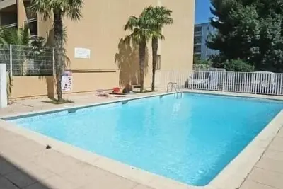 Image de T2 40m2 plein centre, plages à 200m clim+piscine+garage+balcon