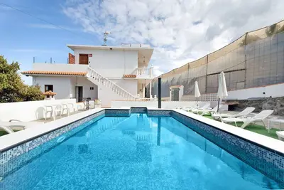 Image de Maison de vacances 'Casa Punta Del Sol Atico' avec vue sur la mer, piscine partagée et Wi-Fi