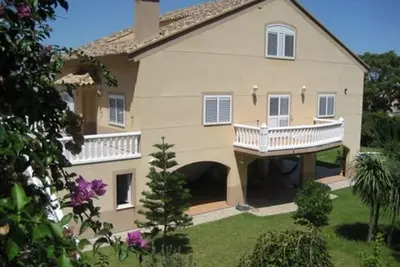 Image de Maison de vacances 'Villa Ă Cullera Valencia' avec vue sur les montagnes, piscine et Wi-Fi.