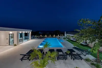 New! Villa Marisa with 51sqm heated, private pool, 5 bedrooms, 4 bathrooms, summer kitchen, views of the Adriatic sea and town Split