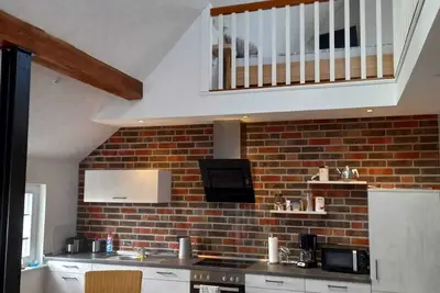 Image de Core-serviced apartment directly on the small dike for up to 4 people