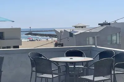 Steps to the Beach with Rooftop Patio View