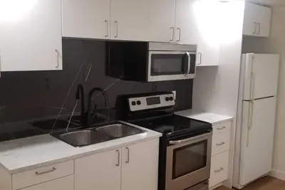 Image de New Modern 2 Bed Suite - Steps From West Edm Mall