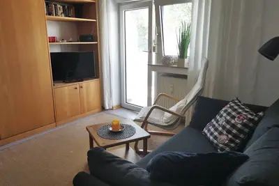 Centrally located 2-room vacation apartment with spacious west-facing balcony