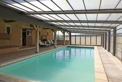 Image de Corps de ferme restauré avec piscine intérieure chauffée