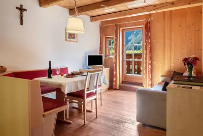 Image de Appartement \"Birke - Fiechterhof\" avec terrasse plein air, jardin et Wi-Fi partagés.