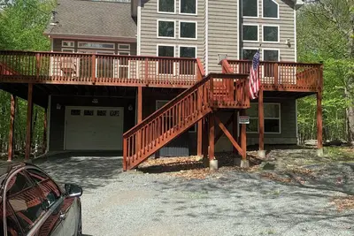 Image de Beautiful Chalet with Pool, Skiing, Beach Lake etc