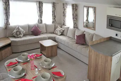 Quality 12ft-wide caravan with one double and two twin.