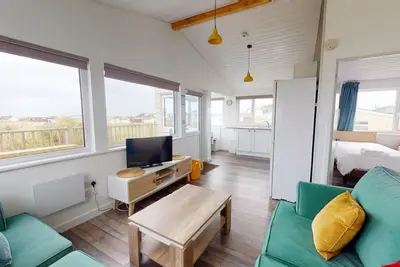 Image de Miramar nestles amongst the dunes, just a short walk to three miles of sandy surf beach below