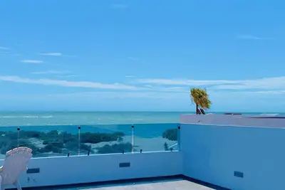 Image de Beach Front House - Ev charging included
