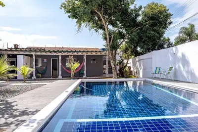 Image de Casa Encantadora e Novinha com Piscina em Peruíbe