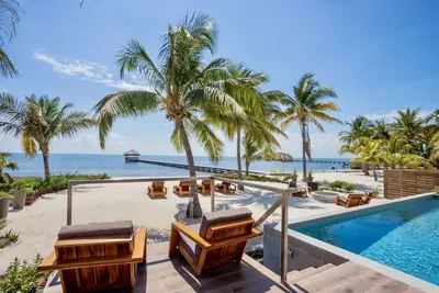 Luxury beachfront home with private pool, gym, & more!