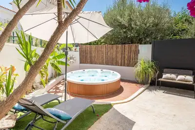 Image de L'Oursinade - Jolie maison avec Jacuzzi et jardin