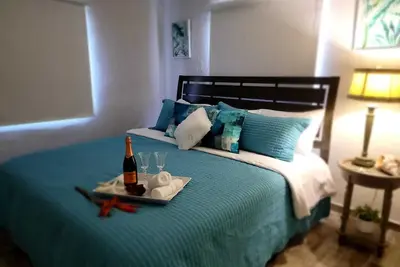 Image de Our beach house harbors a relaxed, soft, modern environment.