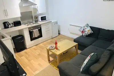 Image de Enjoy a spacious lounge with a cozy sofa bed and a private ensuite bedroom