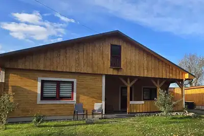 Large wooden house with sauna, in a quiet location by the bathing lake