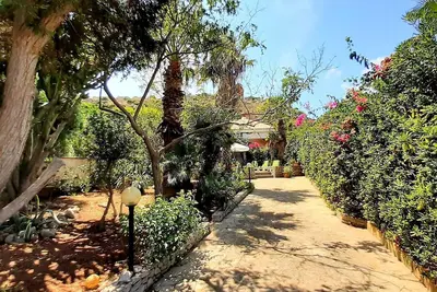 Image de Villa Calamancina99 San Vito Lo Capo ideal for free climbing activities.