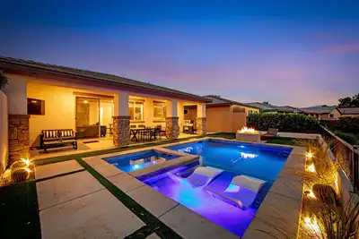 Mountain-view home with private pool/spa, central Ac, washer/dryer, & game room