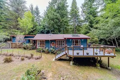 Image de Secluded forest home with deck, private setting, woodstove, WiFi, & patio