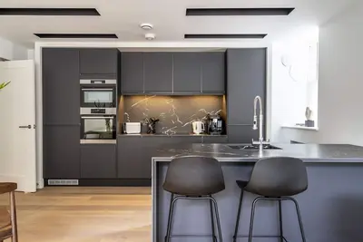 Image de A premium stay that sleeps 4 guests  in 2 bedrooms