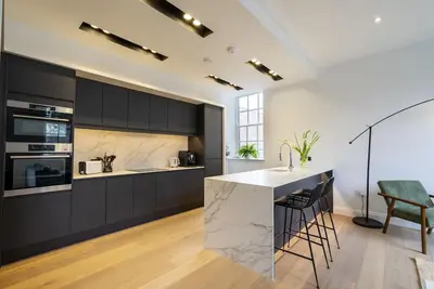 Image de A premium stay that sleeps 4 guests  in 2 bedrooms