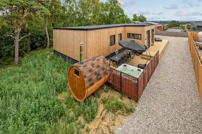 Image de Maison confortable de 6 chambres à.