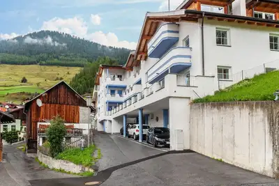 Image de Appartement 'Wohlfühlnest' avec vue sur la montagne, terrasse privée et Wi-Fi