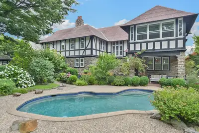 Image de Tudor Mansion With Outdoor Oasis and Swimming Pool