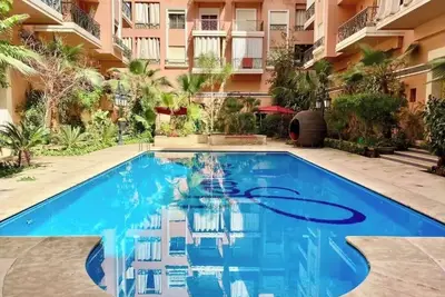 Image de Grand duplex de 140 m² avec terrasse, piscine commune et 2 chambres. Gueliz.