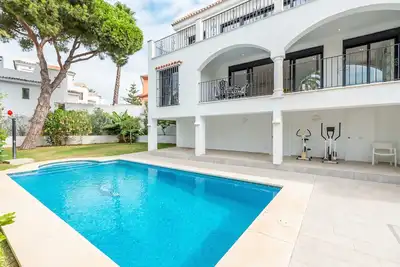 Image de Appartement 'Villa Paloma' près de la plage avec piscine partagée et Wi-Fi