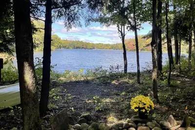 Image de Waterfront camper in Adirondack-like setting