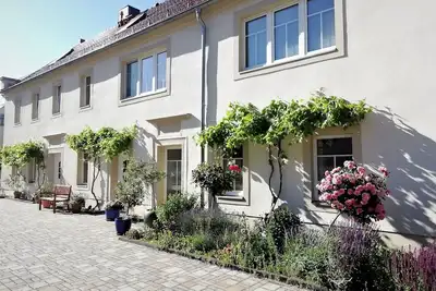 Image de Apartment \"Blütezeit\"- Ferienhof Gräfe restored 3-sided farm with pool & sauna