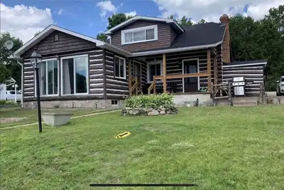 Image de Log Cabin on the Beach