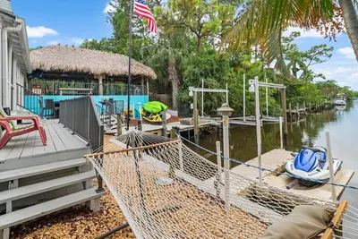 Image de 3br Waterfront Home w/ a boat dock/lift on the St. Lucie River