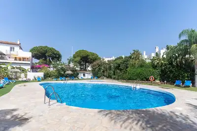 Image de Appartement de vacances 7c Linsay avec piscine partagée, terrasse et Wi-Fi.
