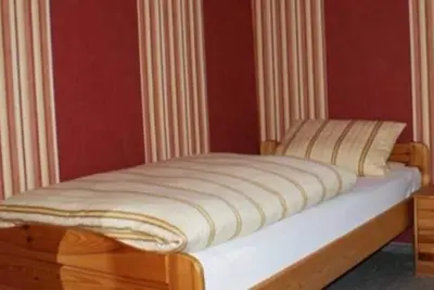 Image de Einzelzimmer 4 - Gasthaus Pension Schumbert