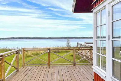 Image de Maison de vacances pour 6 a Hjo-By Traum