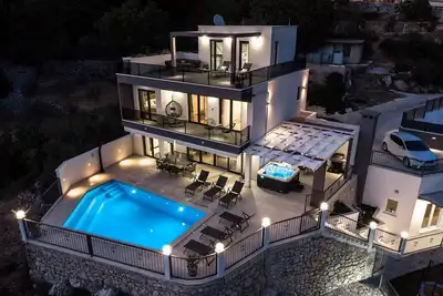 Image de Villa Neda - modern and comfortable accommodation with a Heated pool with massage, Whirlpool, Infrared Sauna, view of Cetina, and natural environment of the Omiš hinterland