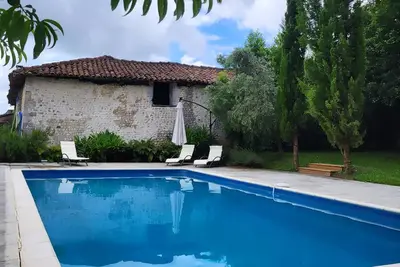 Image de Notre jolie maison de vacances aux volets bleus situee à Nonac en Sud Charente!
