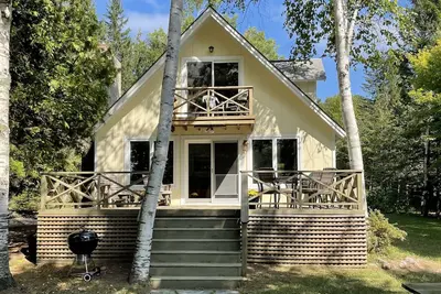 Image de 2026 open, cozy, sunset waterfront cottage on N Lake Leelanau.