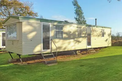 Image de Caravan with one double and two twin.